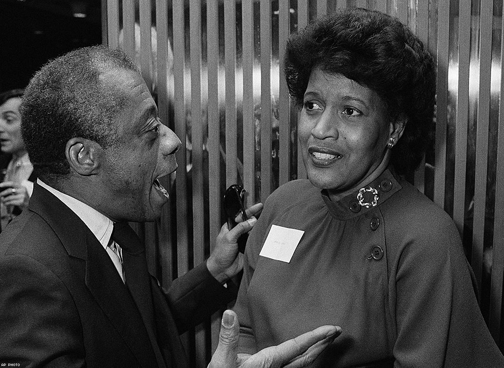 Baldwin and Myrlie Evers