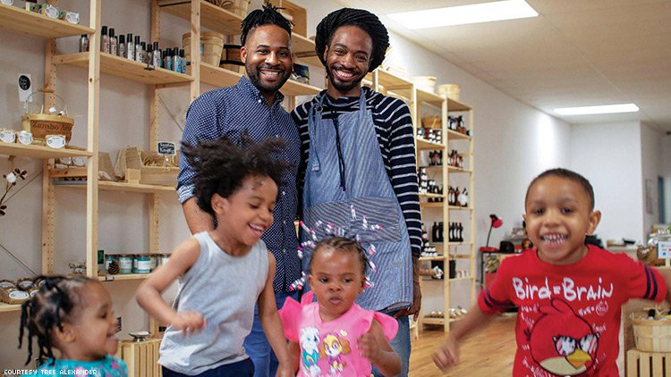 Tree Alexander and his partner Carlton pictured with three of his four children.