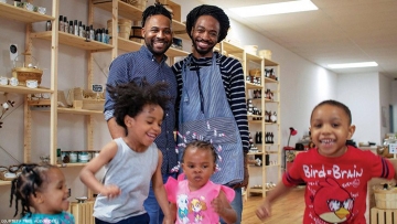 Tree Alexander and his partner Carlton pictured with three of his four children.