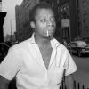 Author James Baldwin, shown on a Harlem street in New York City, June 3, 1963